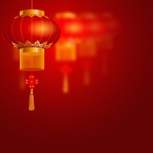 Close up of a red Chinese Lantern on red background