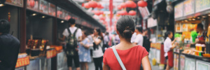 Chinese tourists often stroll through the streets of Rome, particularly in the vibrant tourism scene of the Esquilino Hill area, as they enjoy their vacation and explore.